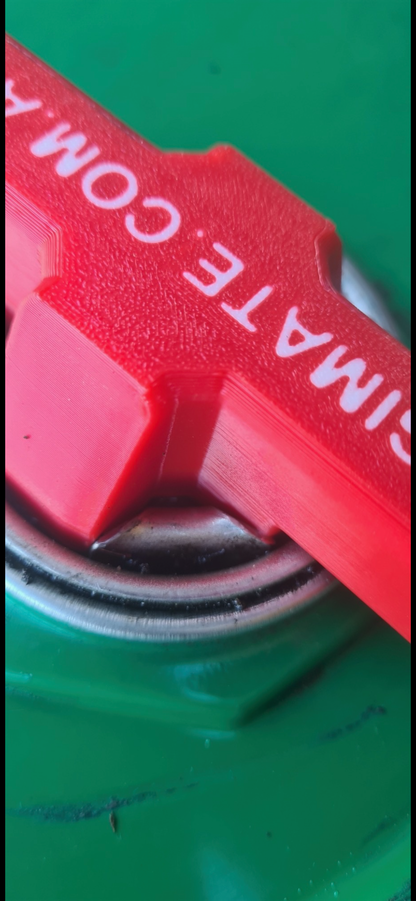 Detail view of the Agimate drum bung key opener showing the fitted tip inside the bung.