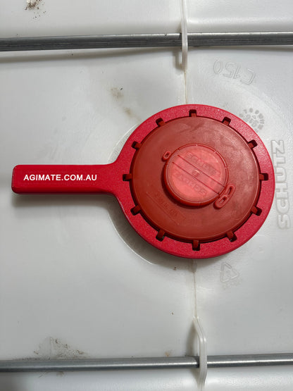 Agimate IBC lid cap spanner fitted over a Schutz IBC tote cap, viewed from above.